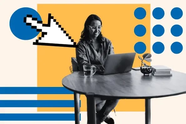 Woman working at laptop desk